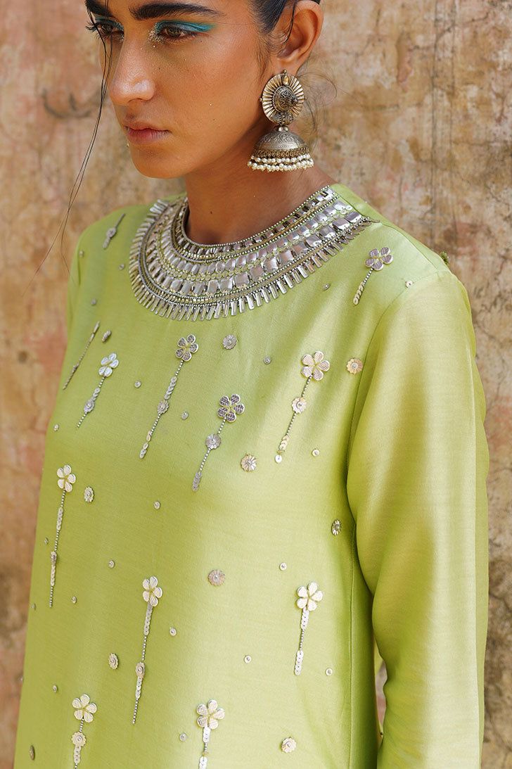 Editor's Note Featuring a green Hand Embroidered Kurta Set in Chanderi. Color: Green Fabric: Chanderi Care: Dry Clean Only About the Designer Modernizing Indian wear with rich handwoven textiles, fresh intricate textures, chic and classic silhouettes, Saksham & Neharicka handcraft all designs to eternal perfection. Their soulful stories are inspired by nature, mythology and popular culture. Embroidery Quotes, Hoops Embroidery, Indian Outfits Modern, Cotton Night Dress, Kurta Set For Women, Iranian Women Fashion, A Line Kurta, Embroidery Neck Designs, Beautiful Dress Designs