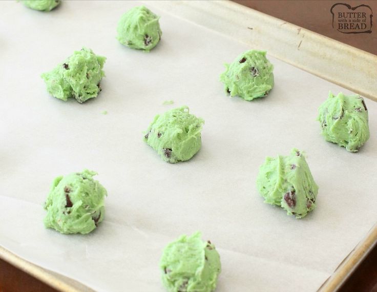 green chocolate chip cookies on a baking sheet ready to go into the oven for bake