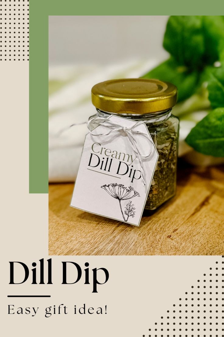 a jar of dill dip sitting on top of a wooden table next to basil leaves