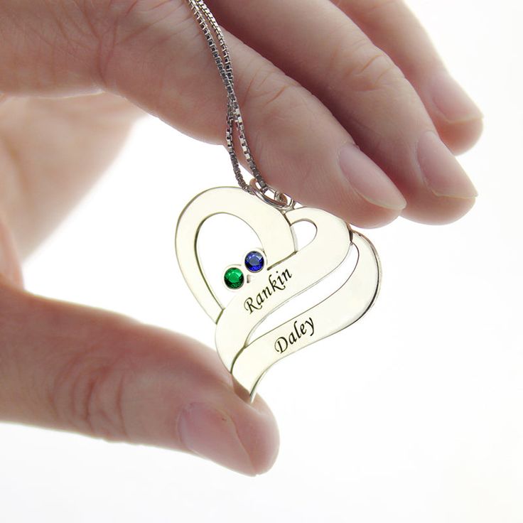 Our Two Hearts Forever One Necklace features beautiful birthstones and personalized engravings of each person. Meticulously handcrafted from .925 Sterling Silver and your choice of plating option: 18K Gold. An excellent gift choice for the one you love. Personalized Heart Pendant Birthstone Necklace As A Gift, Personalized White Gold Heart Necklace For Anniversary, Personalized White Gold Heart Necklace Anniversary Gift, Customizable Gold Heart Necklace In Sterling Silver, May Birthstone Heart Charm Necklace For Anniversary, May Birthstone Necklace With Heart Charm For Anniversary, Anniversary Birthstone Necklace With Heart Charm For May, Sterling Silver Heart-shaped Birthstone Necklace, Sterling Silver Heart Cut Birthstone Necklace For Gift