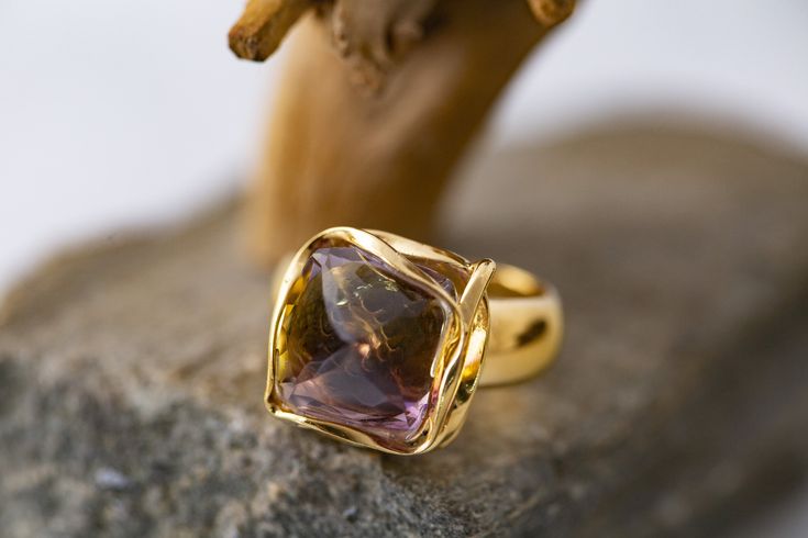 Cordis Art presents designer and elegant ring. Unique piece of Ametrine fitted in sterling silver and covered by 14ct gold layer. Handmade ring. Individual setting has been created for this particular stone. Transparent, bicolored quartz with the color of both amethyst and citrine in the same gem is called Ametrine. Elegant and designer ring. Perfect for evening dress and for every day.  Size of design: length 15mm, width 14mm. Size of the stone: length 12mm, width 12mm, high 12mm. This ring comes with lifetime craftwork warranty for your peace of mind. Gift wrap is also provided.  Cordis means heart. Cordis Art is the place where you can find jewellery made from the depth of my heart. I'm a mum of two girls with special needs. This situation made me to give up my professional carrier. I f Art Presents, Amethyst And Citrine, Gold Hand, Two Girls, Elegant Ring, Ring Unique, Ring Sterling Silver, Rings Statement, Unique Rings