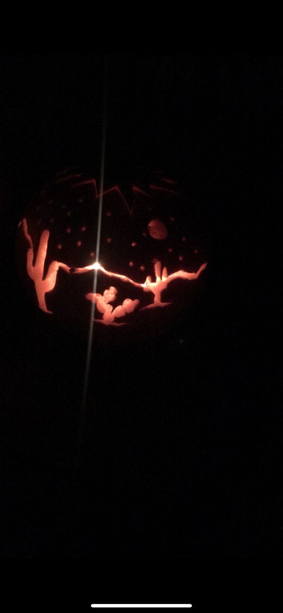 a carved pumpkin sitting on top of a table