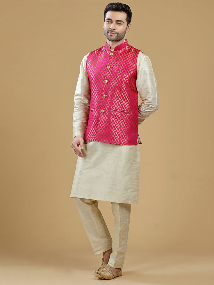 A gold zari brocade vest to pair with any kurta with statement button closures at the front. Occasion: Style this vest with pajama pants and a kurta for a welcome dinner or sangeet night, or style it with a any dress shirt and trousers for a sleek Indian wedding reception look! WASH CARE INSTRUCTIONS - Please Dry clean only. Slight color variation is possible due to digital photography. **Kurta & Pajama not included Pink Nehru Jacket For Festive Occasions, Pink Sleeveless Traditional Wear, Festive Pink Nehru Jacket Straight Kurta, Pink Nehru Jacket With Zari Work For Festive Occasions, Pink Sleeveless Traditional Wear For Festive Season, Traditional Sleeveless Kurta For Festivities, Pink Sleeveless Traditional Wear For Eid, Pink Nehru Jacket Straight Kurta For Diwali, Sleeveless Nehru Jacket For Diwali