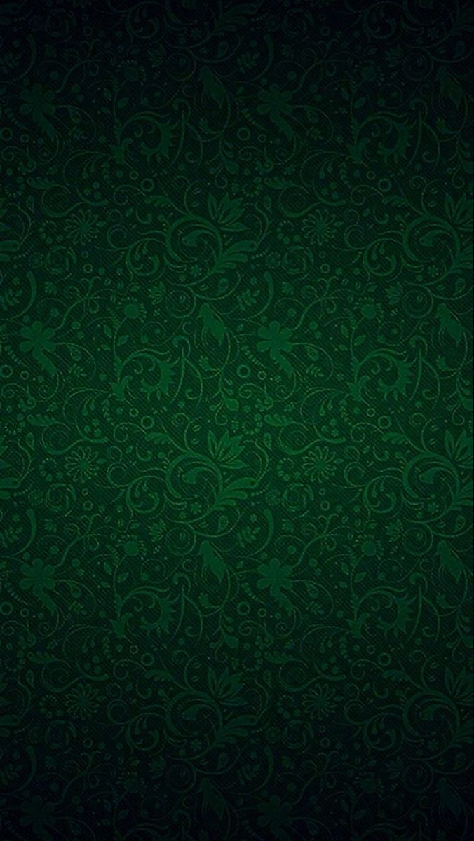 a dark green wallpaper with swirls and leaves