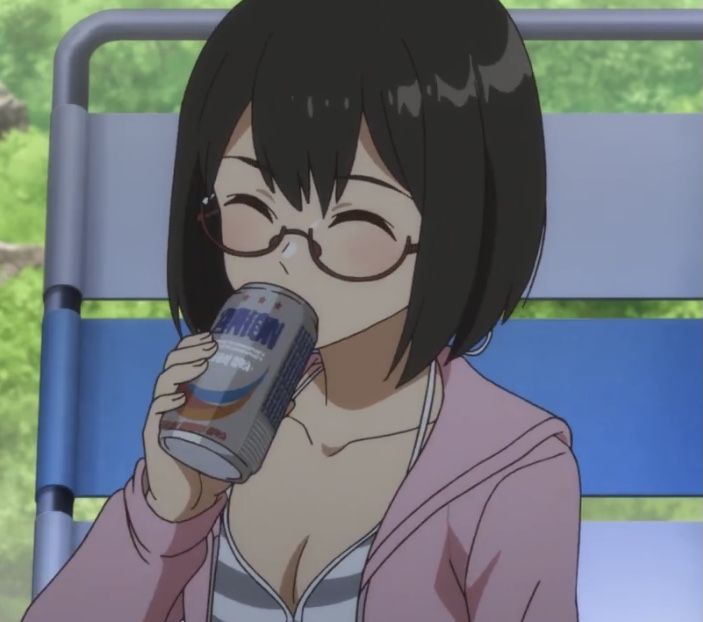 a woman with glasses drinking from a can