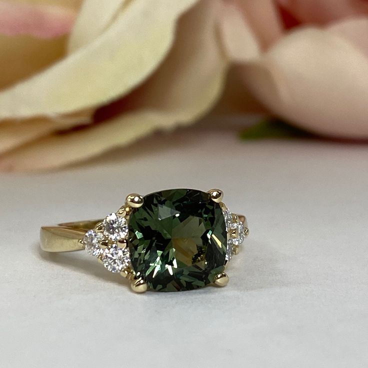 🐣. Offer Xtras! Green Sapphire Cushion Cut And Diamond Engagement Ring, 14k Gold Unique Green Sapphire And Moissanite Accents Ladies Wedding Ring #7167 for $655.00 #MoissaniteRing #BirthdayGift #EngagementRing #ColoredStones #CushionCut #AnniversaryGift #AnniversaryRings #StatementRing #GreenSapphireRing #BirthstoneRing Green Diamond Ring With Accent Stones, Green Moissanite Rings For May Birthstone, Green Sapphire Ring With Center Stone For Anniversary, Green Sapphire Ring With Accent Stones For Anniversary, Green Sapphire Ring With Accent Stones For Formal Events, Green Sapphire Ring With Accent Stones For Formal Occasions, Green Diamond Accented Round Cut Rings, Green Sapphire Ring With Halo Setting For Promise, Green Diamond Accent Rings In Round Cut