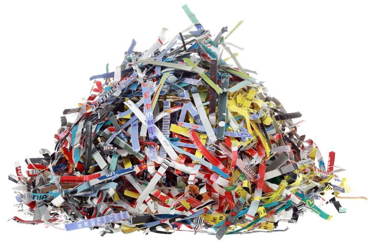 a pile of shredded paper on a white background