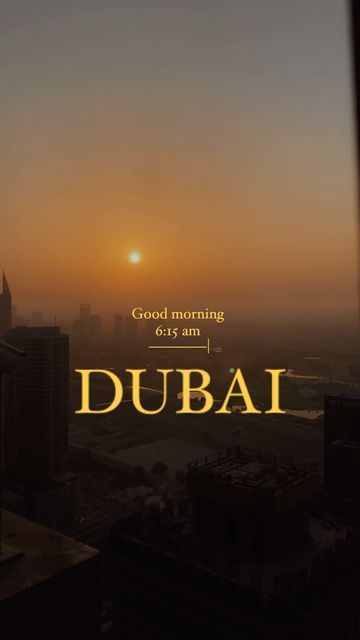 an image of the sun setting over a city with words that read good morning, dubai