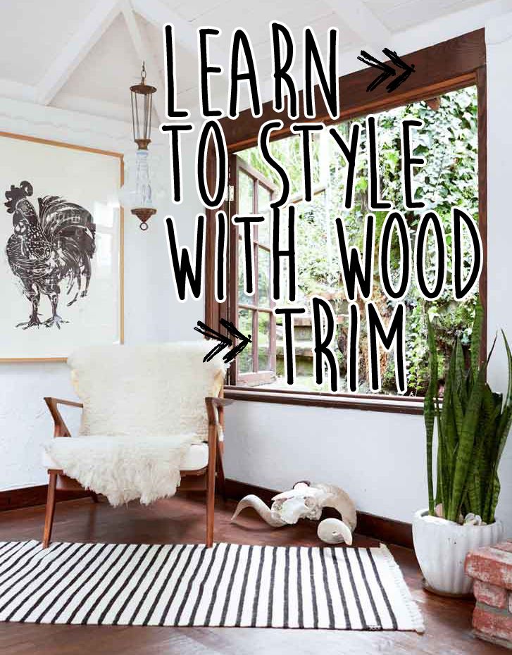 a room with a chair, rug and window that says learn to style with wood trim