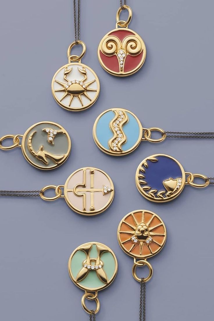 Monica Rich Kosann mini horoscope pendants in yellow gold, diamonds, and different colors of enamel on a blue background Back To University, Jewelry Packaging Design, Jewelry Product Shots, Monica Rich Kosann, Jewelry Lockets, Art Nouveau Jewelry, Zodiac Jewelry, Classy Jewelry, Jewelry Photography