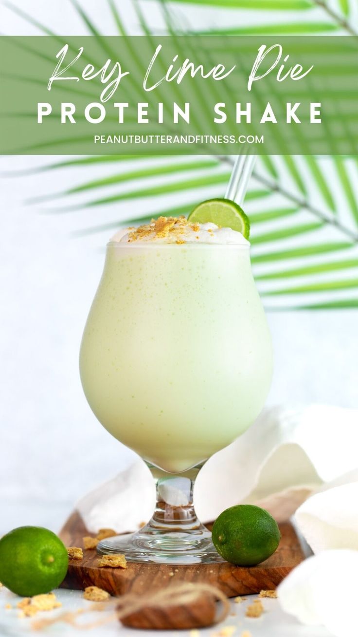 a drink with limes on the side and text overlay that reads key lime pie protein shake