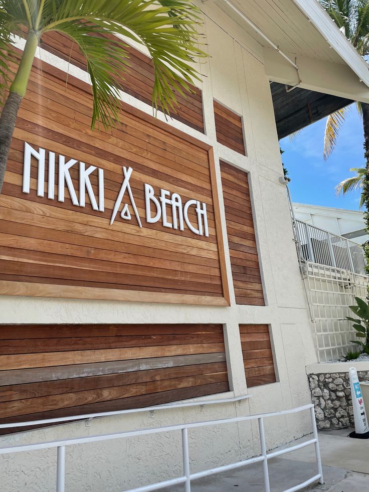 the entrance to nikki beach resort in miami