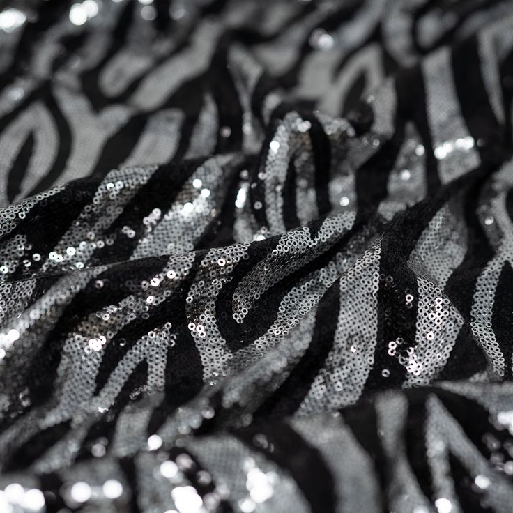 Close up detail of Heidi Zebra Spandex Sequin in Black and Silver. Fabric Stands, Liquid Detergent, Border Print, Sequin Fabric, Modern Fabric, The Memories, Blue Moon, Cotton Lights, Color Card