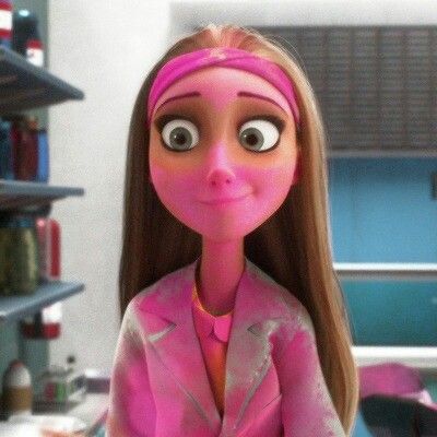 the doll is wearing a pink suit and has long brown hair with eyes wide open