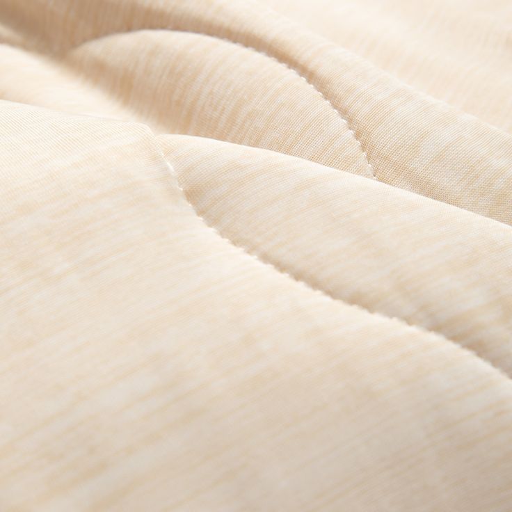 close up view of an unmade bed sheet