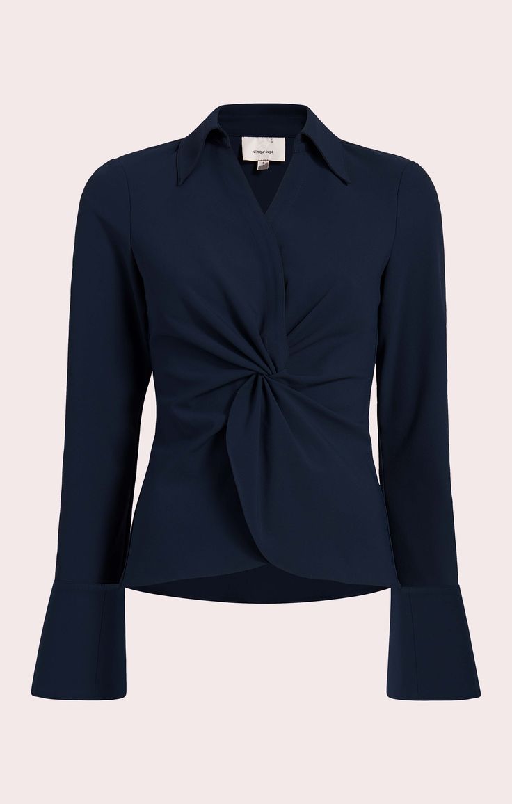 Long-sleeved crepe blouse with twist detail. Details Pull on styleFabric: Sadie CrepeHip lengthTwist front detail Long sleeve Content and Care 93% Polyester 7% PolyurethaneDry CleanImported Measurements 23.25in/59.10cm from shoulderMeasurements from size S