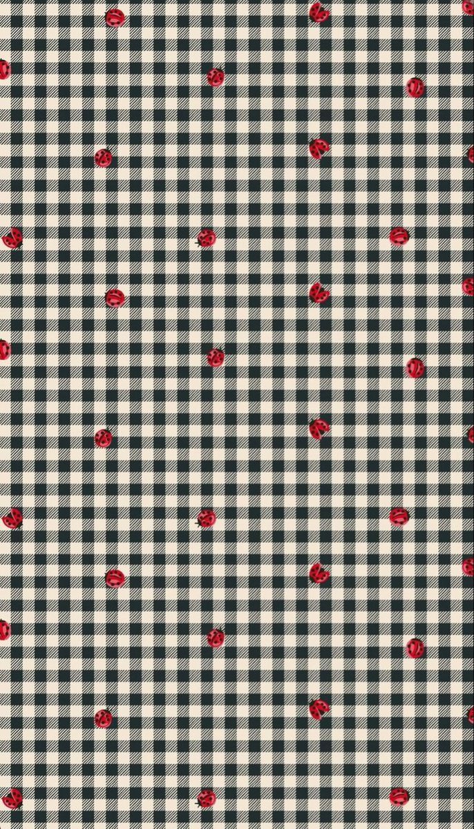 a black and white checkered fabric with red hearts