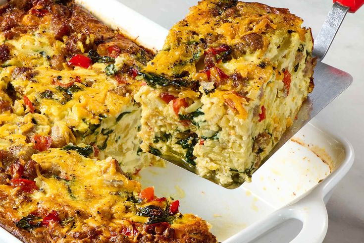 a close up of a casserole in a pan with a knife