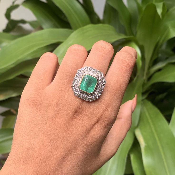 Looking for the perfect present for yourself or a loved one this festive season? Well, this Emerald Ring is the most ideal gift to give someone, that they are sure to flaunt and cherish for decades to come!! Behold the captivating allure of this Art Deco-inspired emerald ring, a true testament to timeless beauty. Nestled at its center is a resplendent 8.30 Carat Emerald, exuding an enchanting green hue that captures the essence of nature's splendor. Sourced from the enchanting mines of Zambia, t Emerald Ring With Diamond Accents For Gift, Dazzling Emerald Ring With Diamond Accents As Gift, Art Deco Emerald Ring With Diamond For Gift, Art Deco Emerald Ring With Diamond As Gift, Luxury Emerald Ring With Rose Cut Diamonds For Anniversary, Luxury Rose Gold Emerald Ring With Diamonds, Luxury Rose Gold Emerald Diamond Ring, Elegant Oval Diamond Ring For Party, Luxury Green Diamond Ring For Anniversary