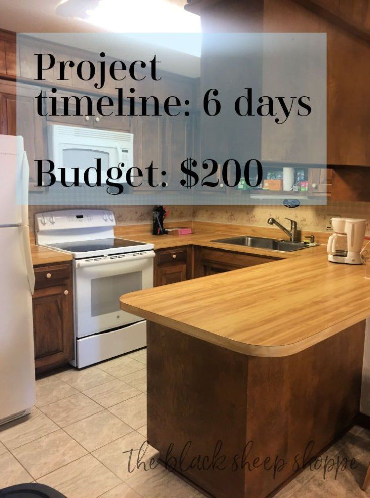 a kitchen with wooden counter tops and white refrigerator freezer next to a stove top oven