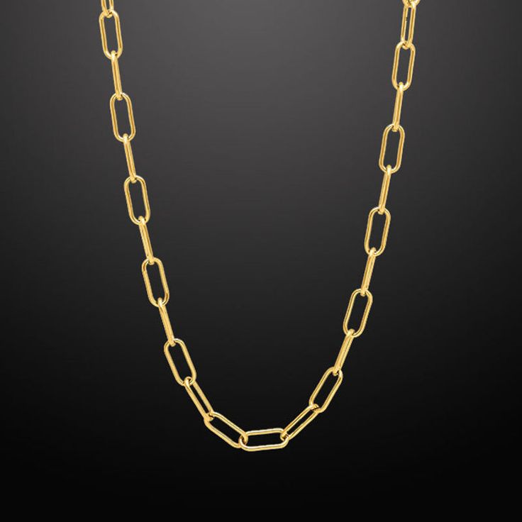 Inspired by classic and original motifs, our modern Paper Clip Link Chain is a versatile accessory that can be dressed up or down. Paper Clip Chain is also a good choice when you want to add a touch of subtle luxury to your everyday look. Paper Clip Link Chain Chain Width: 6mm Wide Chain Length: 26" and 30" Core Material: Stainless Steel Finish: Gold PVD Coated Clasp: Lobster Closure Formal Chain Link Necklace, Luxury Oval Link Box Chain Necklace, Classic Necklaces With Adjustable Chain And Rectangular Links, Classic Necklaces With Rectangular Links And Adjustable Chain, Classic Gold Chain Necklace For Formal Occasions, Formal Gold Link Chain Necklace, Classic Necklace With Rectangular Paperclip Chain, Classic Chain Link Necklace With Adjustable Chain, Luxury Paperclip Necklaces For Formal Events