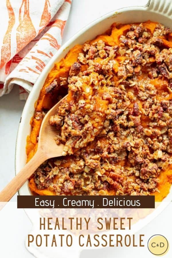 sweet potato casserole in a white dish with a wooden spoon and text overlay that reads easy, creamy, delicious healthy sweet potato casserole