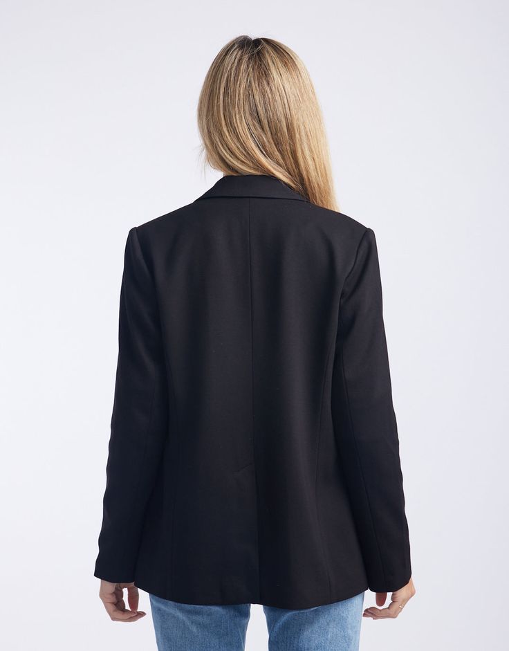 DESCRIPTION Elevate your wardrobe with the sophisticated Timeless Ponti Blazer from White & Co The Label. This classic blazer features a one-button closure and functional pockets, adding both style and practicality to your outfit. Made from comfortable stretch ponti fabric and fully lined for a smooth fit, this blazer is designed to keep you looking polished from morning meetings to evening dinners. Its versatile design makes it a perfect addition to any wardrobe, providing endless styling optio Morning Meetings, Classic Blazer, Black Blazers, The Label, Casual Looks, Product Description, Blazer, Wardrobe, Fabric