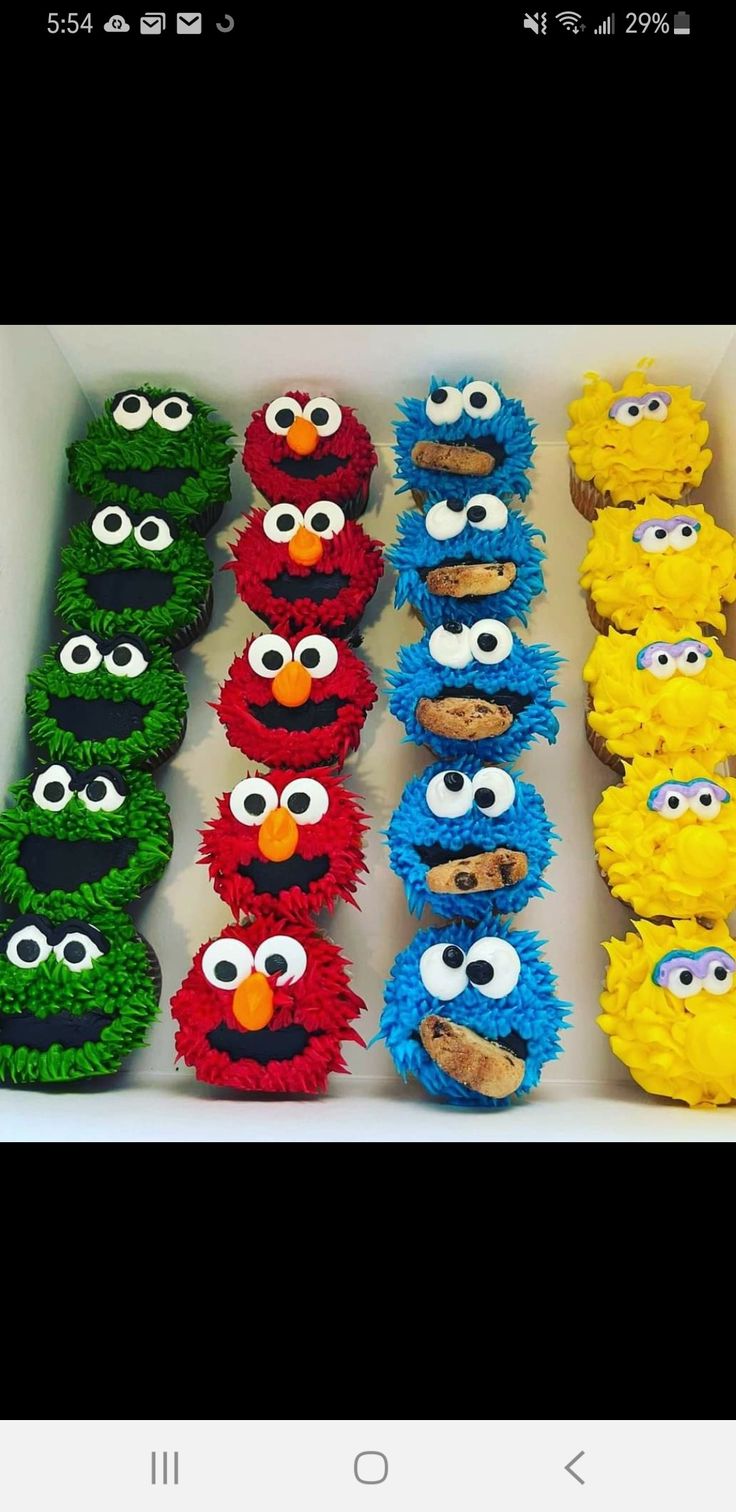 there are many cupcakes made to look like sesame street characters