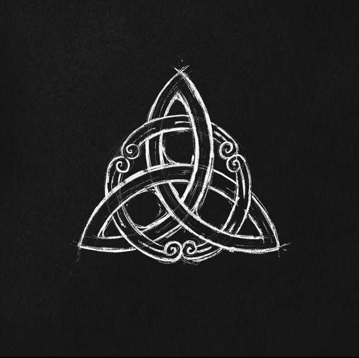 a drawing of a celtic knot on a blackboard