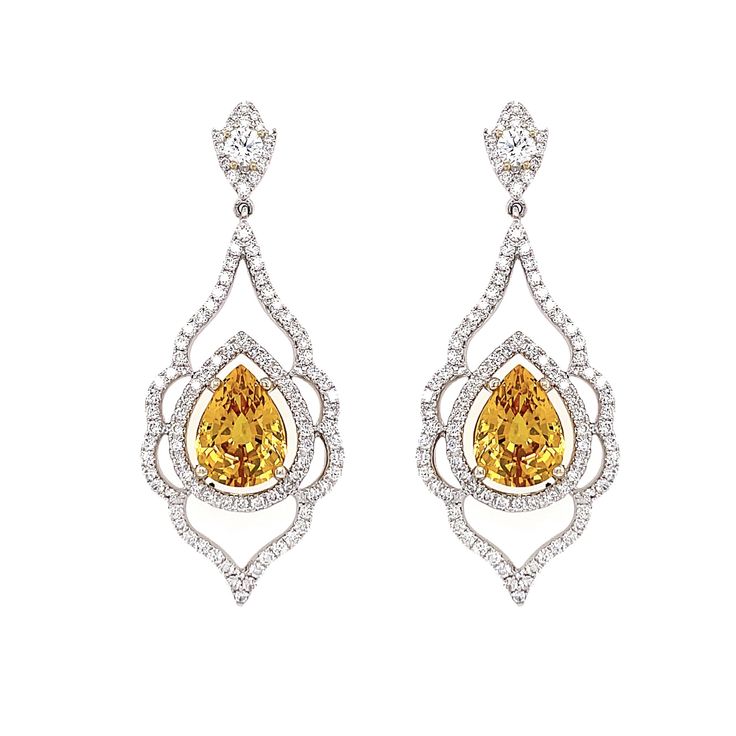 18k White Gold Gemstones: 2 Pear Shape Yellow Sapphires, 5.74tcw Diamonds: Round Brilliant, 1.80tcw Luxury Pear-shaped Diamond Earrings With Gemstones, Yellow Diamond Earrings With Gemstone, Luxury Pear-shaped Cubic Zirconia Earrings, Elegant Yellow Diamond Earrings, Luxury Drop Earrings With Pave Setting, Luxury Platinum Gemstone Earrings, Luxury Pear-shaped Gemstone Diamond Earrings, Luxury Diamond Bridal Earrings With Gemstone, Luxury Bridal Diamond Earrings With Gemstones