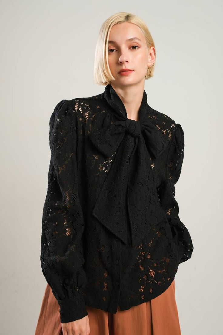 A woven lace top featuring front bow tie, button down and long sleeve Details: Self : 70% Cotton 30%. Nylon Size & Fit - Model is 5`8" And Wearing Size Small- Measurements Taken From Size Small- Approx. Length: 25" Black Bow Blouse For Fall, Evening Tops With Bow And Long Sleeves, Long Sleeve Evening Tops With Bow, Evening Long Sleeve Top With Bow, Party Long Sleeve Blouse With Bow Tie, Fall Formal Blouse With Bow Detail, Long Sleeve Tops With Bow Tie For Fall, Formal Fall Blouse With Bow, Formal Bow Blouse For Fall