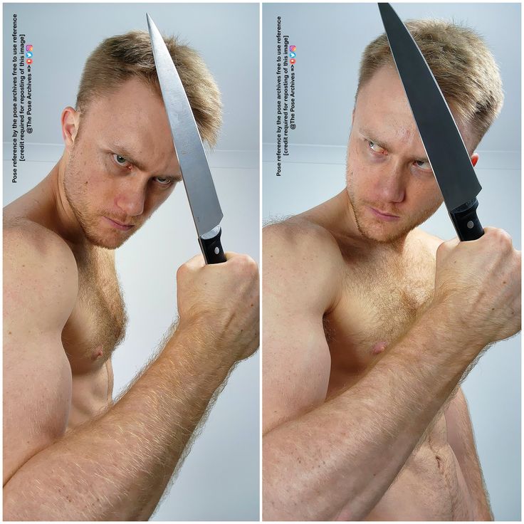 a man holding a large knife over his shoulder and looking at the camera with no shirt on