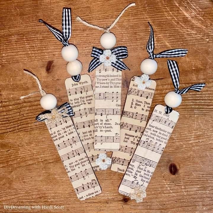 five bookmarks with musical notes and beads on them