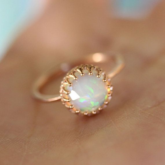 Like a little moon glowing with rainbow fire. This stunning white jelly opal dances with iridescence like you wouldnt believe. Such an elegant piece and with so much character. Perfect from day to night.  Each piece of opal has different color, its unique and charm. This listing is for one piece of opal ring only.  ~~~~~~~~~~~~~~~~~~~~~~~~~~~~~~~~~~~~~~~~~~~~~~~~~~~~~~~~~~~~~~~~~~~~~~~~~ Gem: 8mm / approx. 1.60ct / genuine translucent opal / fair trade Metal: recycled 14k solid... Recycled Gold Ring, Nature Inspired Wedding Ring, Jelly Opal, Color Rings, Gold Color Ring, Pink Tourmaline Ring, Rainbow Fire, Opal Ring Gold, 14k Rose Gold Ring