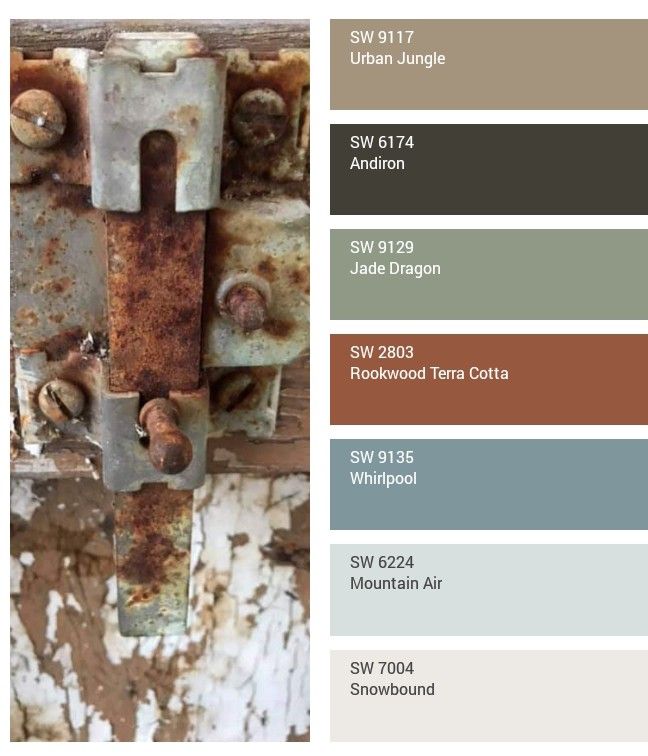 an old rusted metal door with paint swatches on it and the colors are different