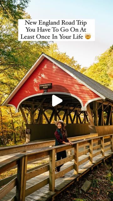 a woman standing on a wooden bridge in the middle of autumn with text overlay reading new england road trip you have to go on at least once in your life