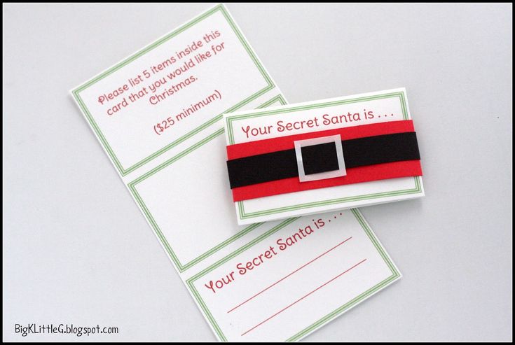 two business cards with santa's red and black ribbon on them, one has an image of a square in the center