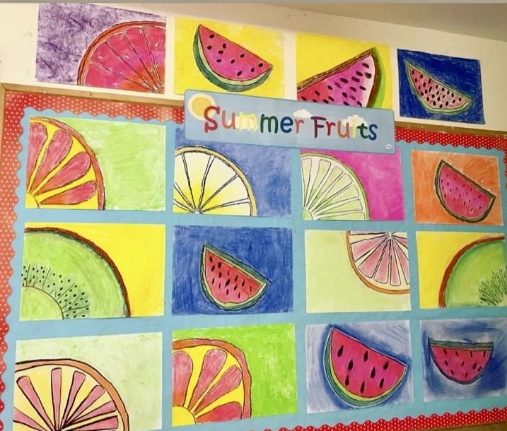 a bulletin board with watermelon slices on it and the words summer fruits written in large letters