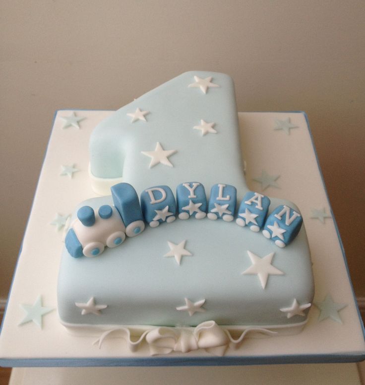 a blue and white cake with stars on it