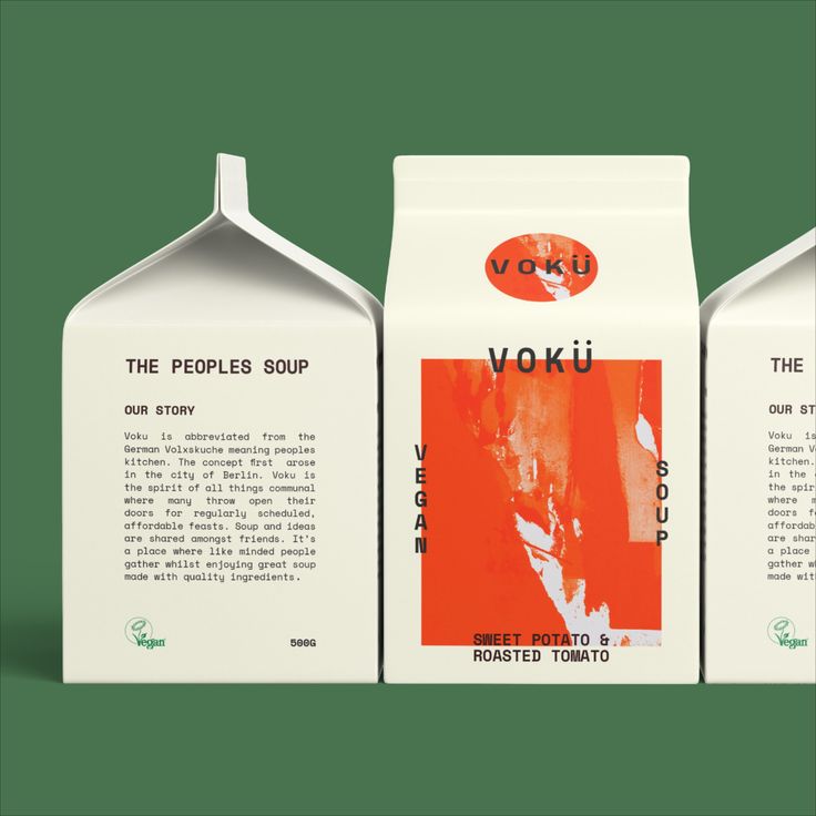 three packages of yoki milk on a green background