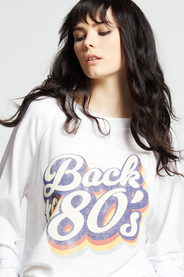 We're kickin' it old school with this retro style sweatshirt. Featuring "Back to 80s" verbiage with retro inspired colors and a distressed look for the perfect vintage aesthetic. Made with soft vintage washed fabric, ribbed hems, a crew neckline, and a comfy oversized fit. Retro Cotton Sweatshirt For Fall, Oversized Retro Sweatshirt, Vintage Tops With Ribbed Cuffs For Spring, Vintage Ribbed Cuffs Top For Spring, Relaxed Fit Throwback Sweatshirt With Graphic Print, Trendy French Terry Crew Neck Tops, Throwback Graphic Print T-shirt For Fall, Retro Oversized Sweatshirt For Spring, Oversized Retro Sweatshirt For Spring