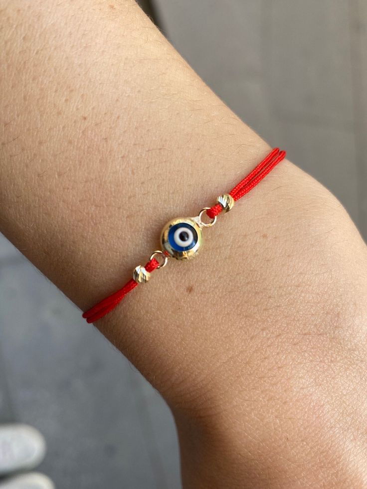 ✨Evil Eye Bracelet 14K Solid Gold / Minimalist Design Nazar Bracelet / Gift for Her Evil Eye Bracelet / Unique Design by Likya✨ Material: Solid Gold (Not Gold Filled or Gold Plated) Karat: 14K (real gold stamp 585)  Gold Color: Yellow Gold  ✅Available in yellow gold, rose gold or white gold options 🎁You can give it directly as a gift to your lover, girlfriend, colleague, good friend,or yourself! Or just give the most special person in your life as a surprise gift to remind her/him how much you Gold Resizable Round Evil Eye Bracelet, Adjustable 14k Gold Bracelet As Gift, Handmade 14k Gold Minimalist Bracelets, Handmade Minimalist 14k Gold Bracelets, Resizable 14k Gold Bracelets As A Gift, Resizable 14k Gold Bracelets For Gift, Minimalist 14k Gold Red Bracelets, Minimalist Red 14k Gold Bracelets, Minimalist Red 14k Gold Bracelet