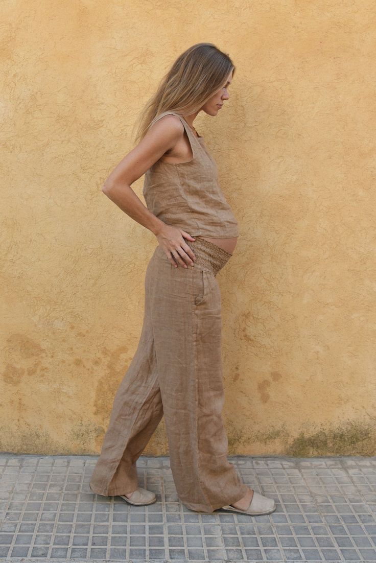 Style // The perfect light toned, neutral brown linen pants The must have, high-rise and wide leg linen pants. Our Rio Pants are loose fitting and feature a large elastic waistband for ultimate comfort. Flattering and stylish, and of course with side pockets too, the Rio Pants are the ideal casual and comfortable sunshine staple, and their flexible fit make them a dreamy option for paternity or postpartum pants as well. Based off the design of our best selling Isla Pants, but with a little more Postpartum Pants, Brown Linen Pants, Human Milk, Clothes Basket, Wide Leg Linen Pants, Spring Outfits Women, Black White Pink, Black Linen, Rye