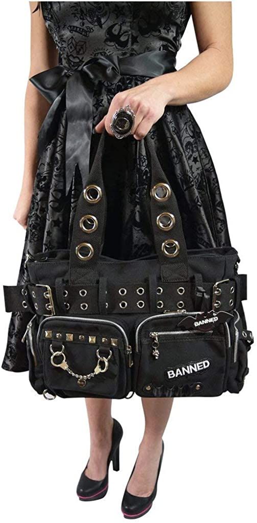 Our alternative black shoulder bag features studs, chains, handcuffs and more.A spacious shoulder bag with large twin front zipped pockets with more than enough space for anything you can need, and comes with metal handcuff and pyramid stud decoration. The webbing handles are matched by a webbing belt that shapes the bag and can be loosened. Handy side pockets for easy access and pen holders on the outside mean this bag packs a serious punch.- Large spacious shoulder bag- Monochrome stiped patte Black Punk Rectangular Shoulder Bag, Punk Style Black Rectangular Bag, Black Rectangular Punk Bag, Black Rectangular Punk Style Bag, Black Punk Shoulder Bag With Zipper Closure, Alternative Black Shoulder Bag With Zipper Closure, Alternative Black Shoulder Bag With Zipper, Black Alternative Shoulder Bag With Zipper Closure, Alternative Style Black Shoulder Bag With Zipper