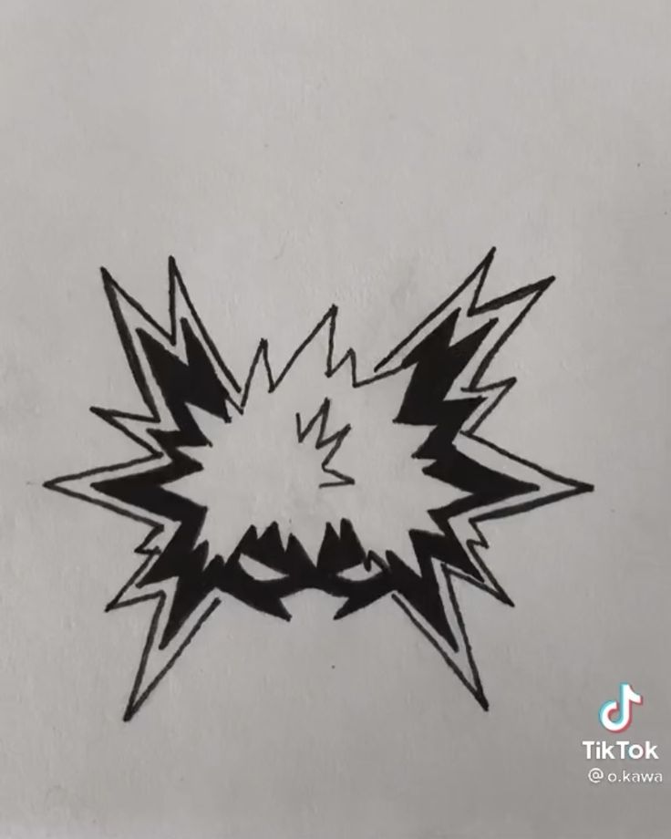 a drawing of an exploding starburst on a white paper with the word,'it