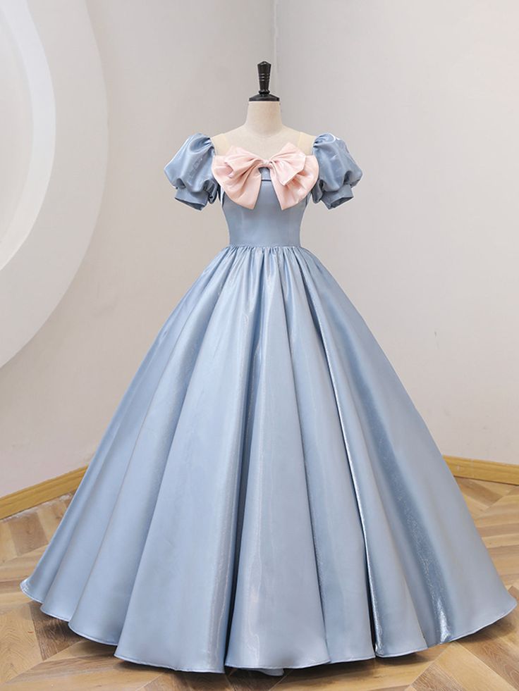 Blue Satin Floor Length Prom Dress with Bow Light Blue Satin Dress For Banquet, Blue Satin Evening Dress For Banquet, Evening Blue Dress With Bow Detail, Blue Satin Gown For Banquet, Blue Satin Prom Evening Dress, Blue Satin Ball Gown Dress, Blue Satin Dress For Prom, Blue Fitted Satin Gown, Blue Satin Finish Dress With Fitted Bodice