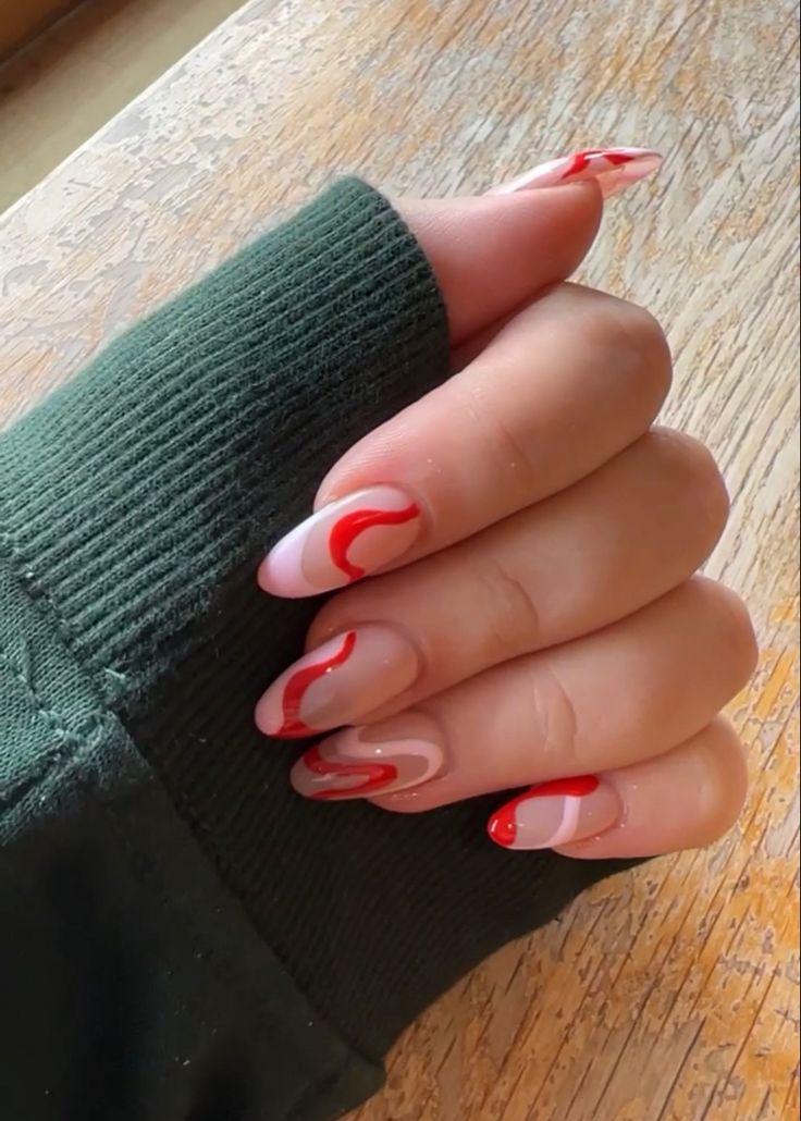 Almond Nails Designs Red And White, Simple Swirly Nails, Red And White Oval Nails, Swirl Red Nails, Red Nails Line Design, Red Wavy Nails, Pink Red Swirl Nails, Red Almond Design Nails, Red Swirl Nail Designs