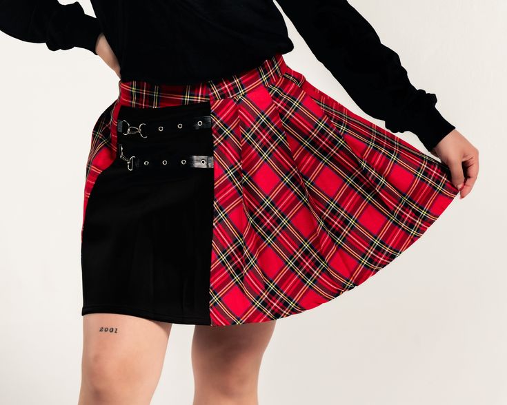 (Model is wearing a size Medium) Size Waist Hips Length Small 25” 35” 15” Medium 27” 37” 16” Large 29” 38” 16” XL 31” 39” 16” XXL 33” 40” 17” Fitted Alternative Pleated Skirt, Punk Fitted Skirt For School, Punk Style Fitted Skirt For School, Fitted Mini Skirt For School In Winter, Fitted Winter Mini Skirt For School, Edgy Fitted Skirt For School, Fitted Mini Skirt For Spring In Alternative Style, Fitted Alternative Style Mini Skirt For Spring, Fitted Winter School Bottoms