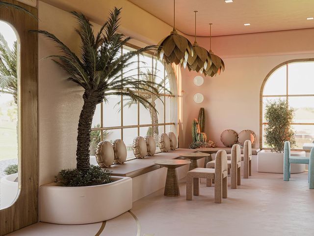 a dining room with large windows and palm trees in the center, surrounded by white chairs