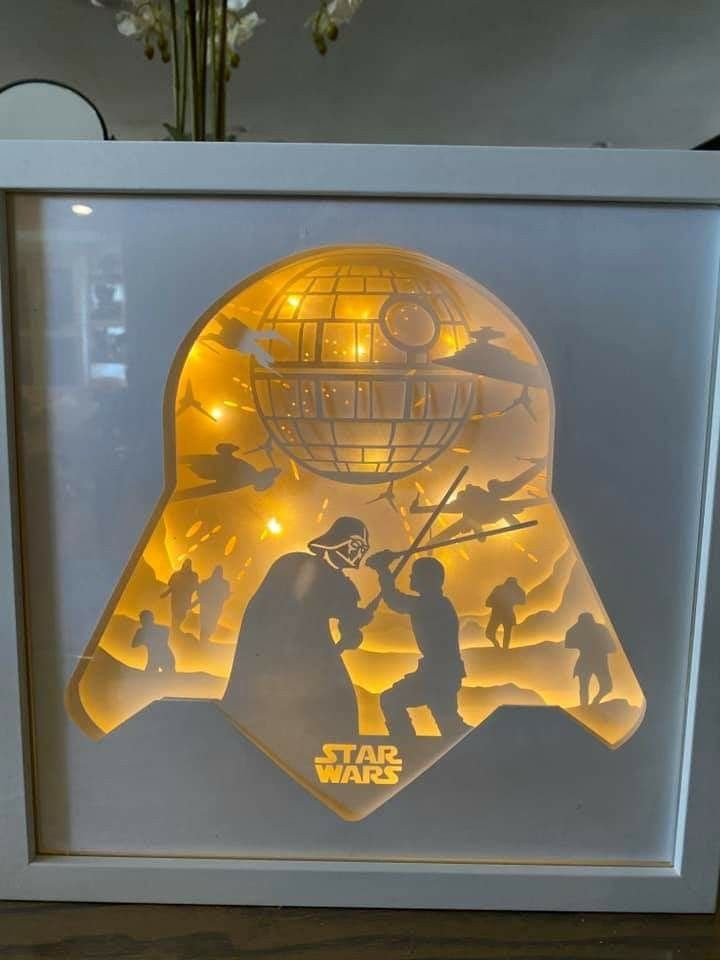 a star wars light up shadow box with lights inside